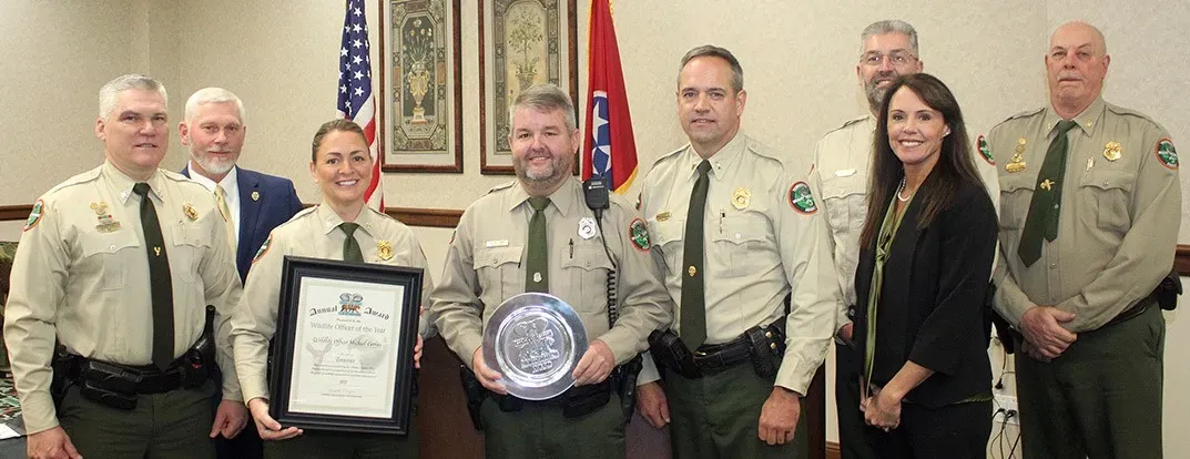 Michael Cavins receiving the Wildlife Officer of the Year award alongside TWRA colleagues