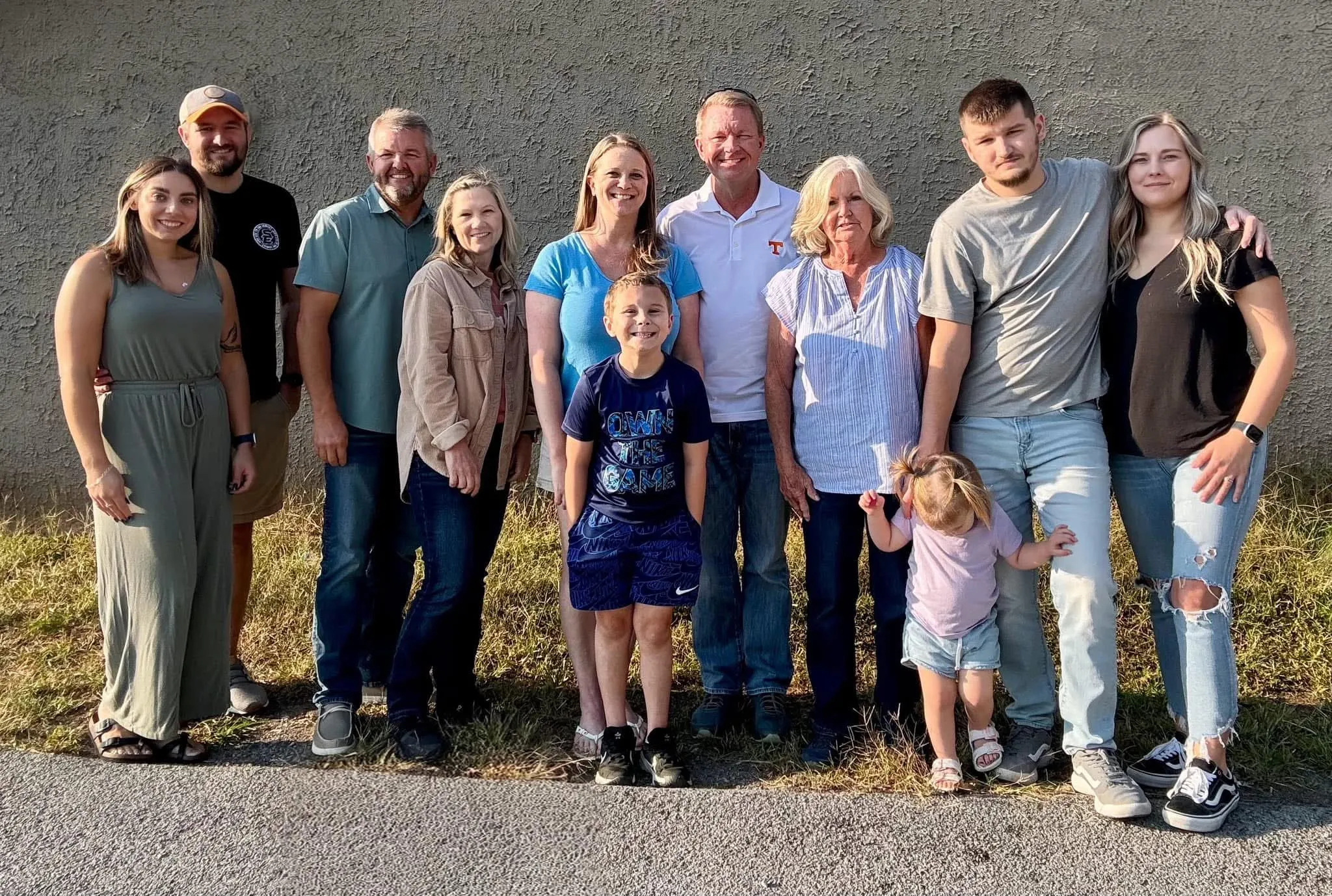 Michael Cavins with his wife Pamela, their children, and grandchildren in Claiborne County